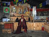 14 05 Lone Monk In  Gompa Near Tangnag With Statues Of Avalokiteshvara, Amitabha, Padmasambhava Above The Altar The small gompa beneath a great rock overhang just south of Tangnag is looked after by one solitary, but very friendly, monk. There are statues of Avalokiteshvara, Amitabha, and Padmasambhava on the altar,